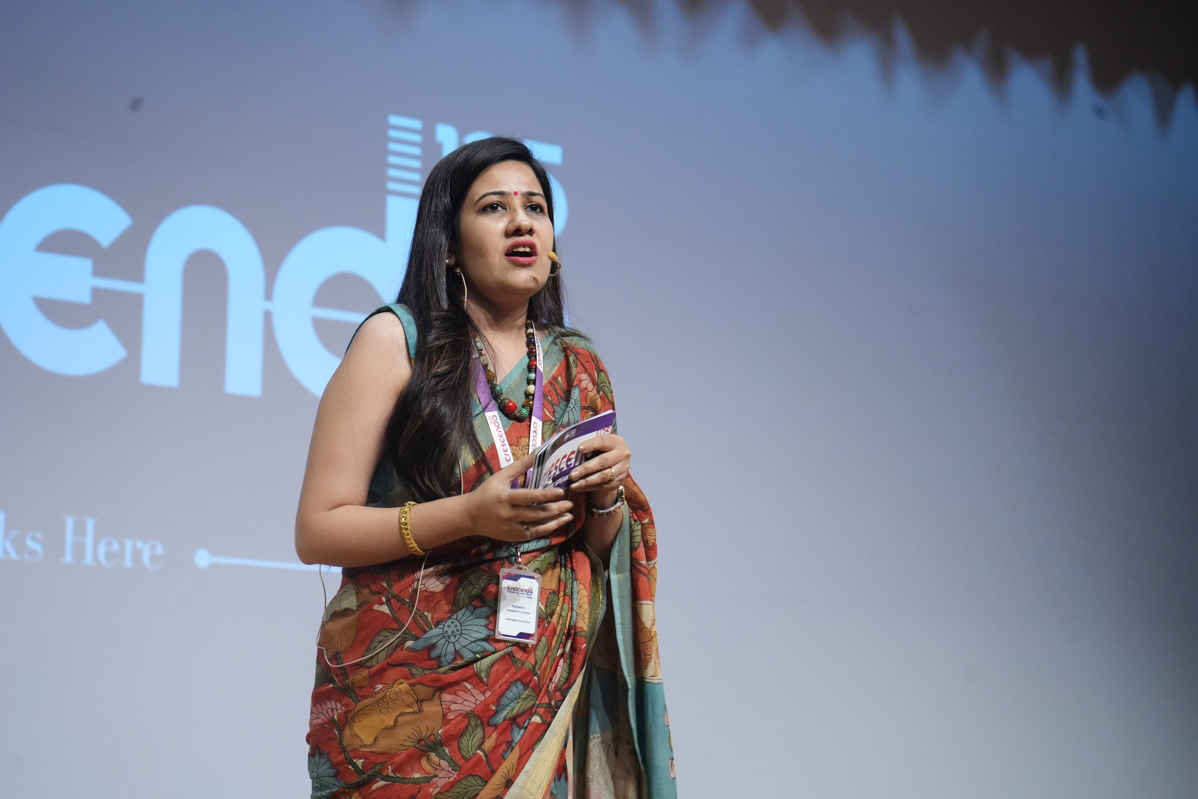 Coach Rachana speaking to a leadership audience